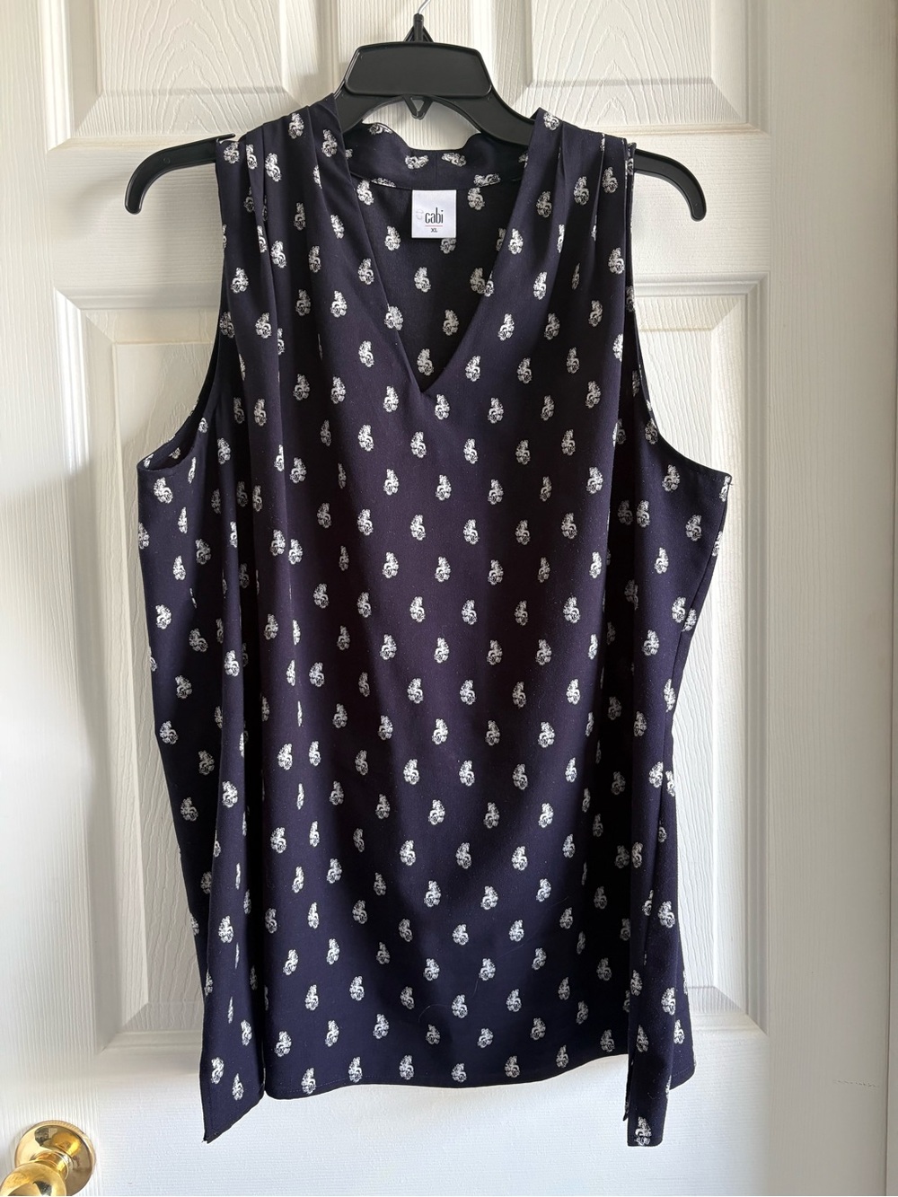 CAbi navy sleeveless V-neck camisole with white floral motif